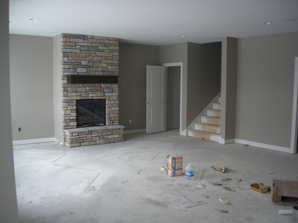 basement fireplace in parade of homes model home