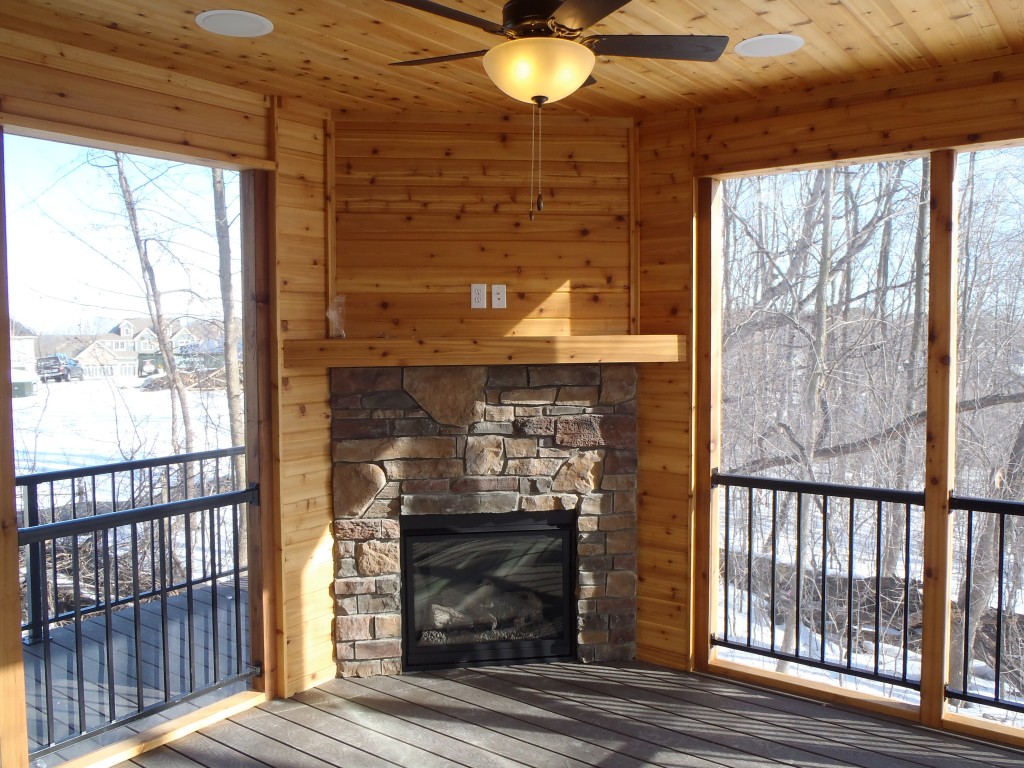 fireplace on porch of new home in Plymouth