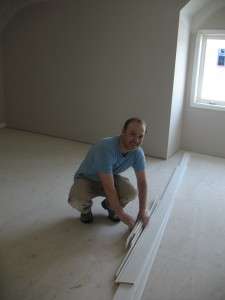 Adding trim to the Concordia at Spring Meadows of Plymouth, trimming out the living room of a luxury new home