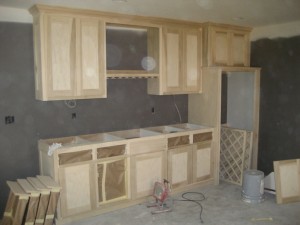 new home construction in Minneapolis, installation of new cabinets in family room, Lakeside cabinetry, Lakeside Cabinets and Woodworking