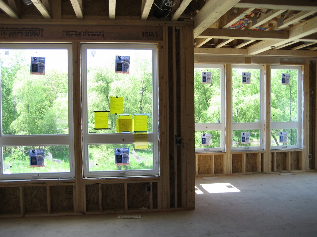 new home construction in Plymouth Minnesota, new home rough in, installation of windows, electrical rough in