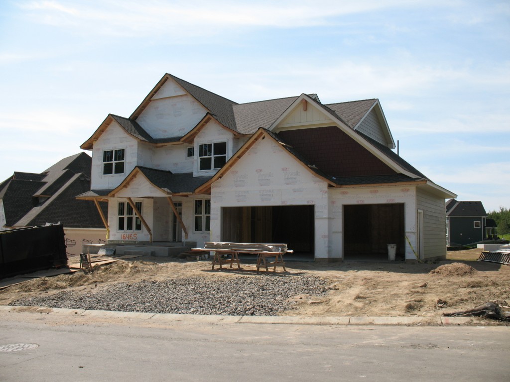 new home siding installation, James Hardie siding on new home, before picture of new home getting siding