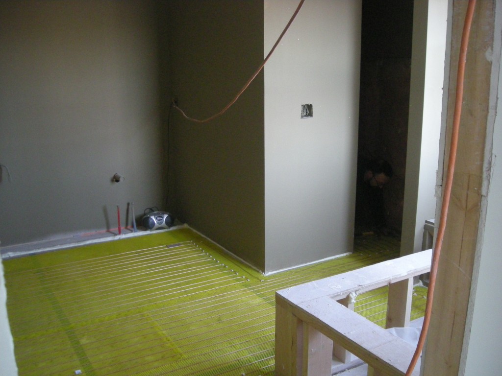 in floor heating installing in new luxury home in Plymouth Minnesota