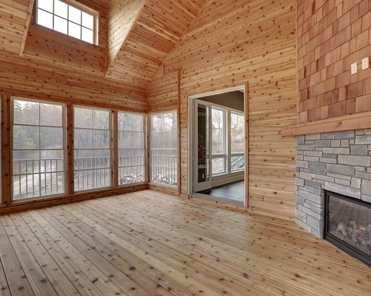 porch with fireplace custom home in Orono