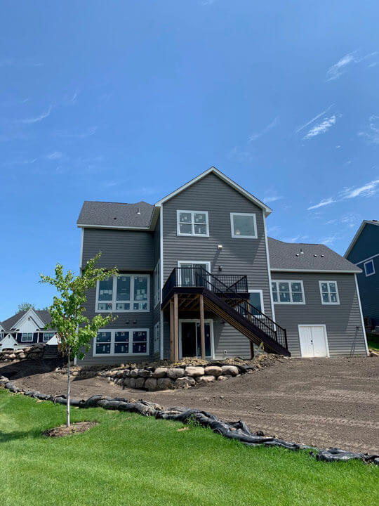 Exterior of one and a half story home on lake minnetonka