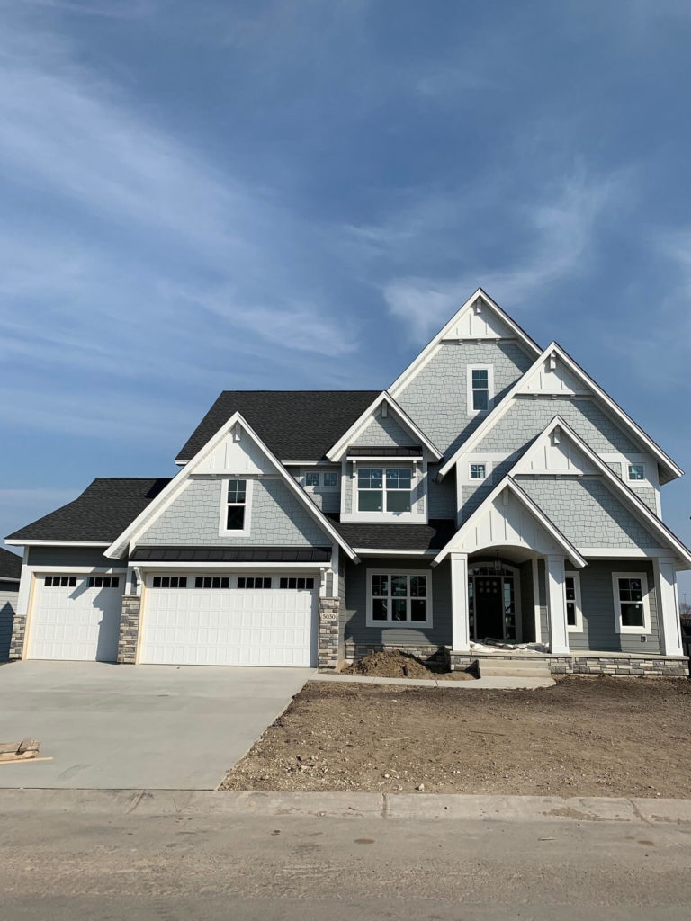 Exterior of two story custom home by NIH Homes